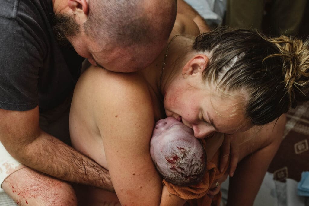 kissing baby for the first time